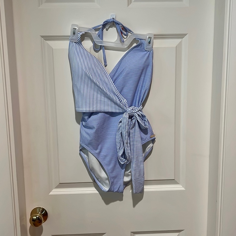 Vince Camuto - Woman’s, one-piece swimsuit. Ties around waist. Never worn.